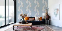 Living room wallpaper featuring Soft Blue Leaf pattern and boho coastal mood