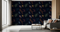 Botanical wallpaper with floating leaf motifs and a dramatic dark backdrop