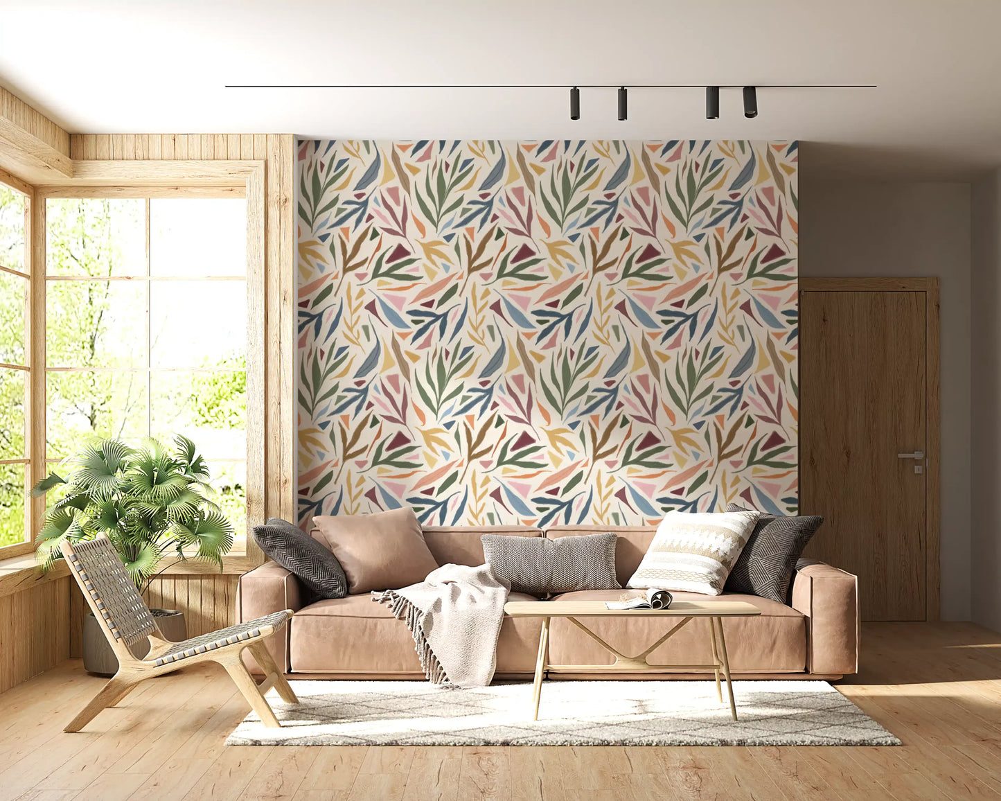 Living room with Tropical Wallpaper and painterly foliage on a light base