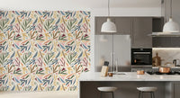 Botanical art wallpaper showing soft blue foliage and peach geometric shapes