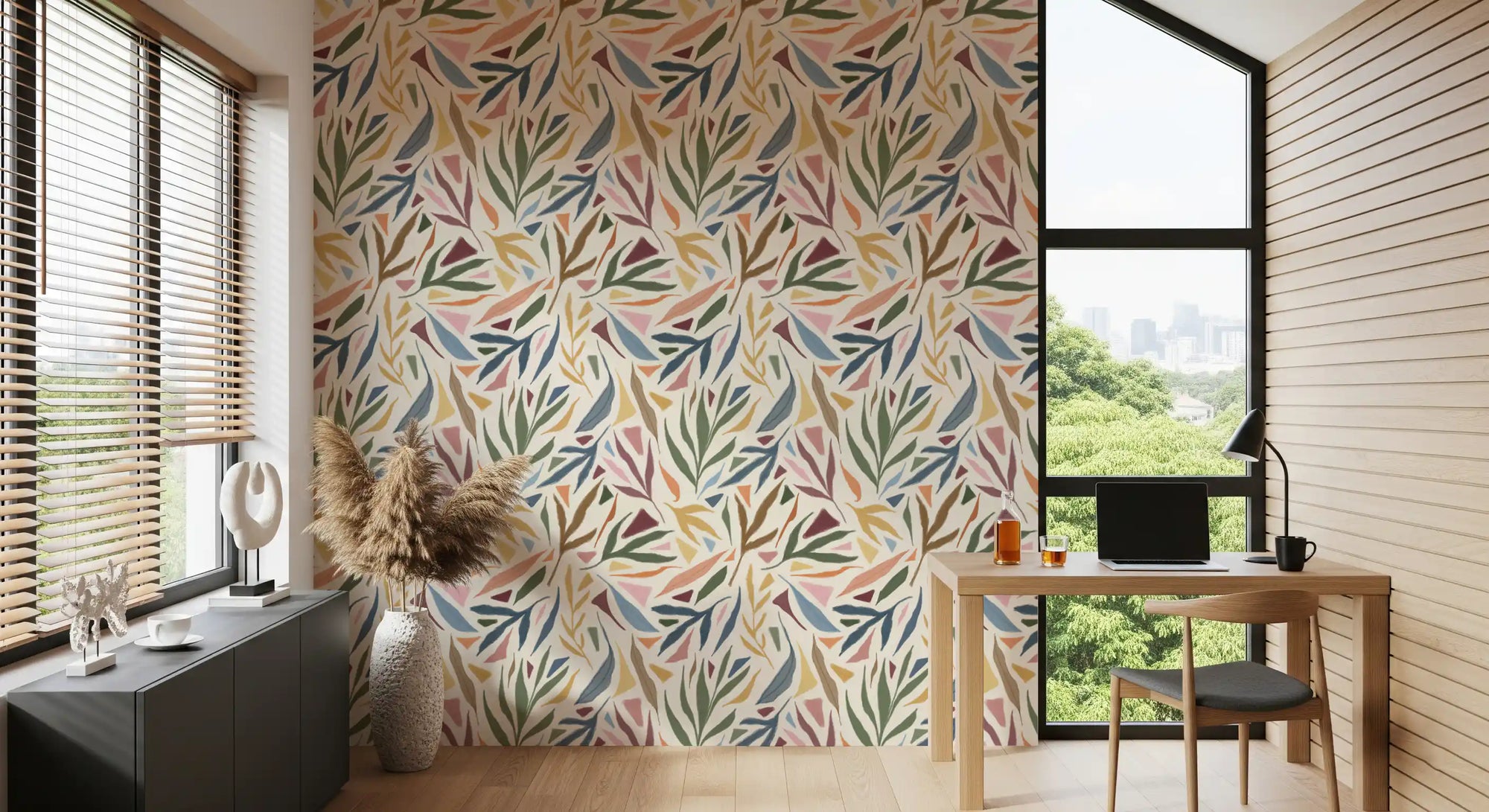 Office area with Tropical Painted Collage wallpaper and soft leafy artwork