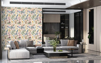 Living room wall in Painted Collage Wallpaper with abstract tropical shapes