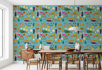 Dining area with blue produce wallpaper and bright fruit slice accents