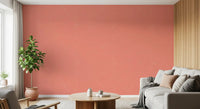 Mid century modern wallpaper in coral on a hallway accent wall