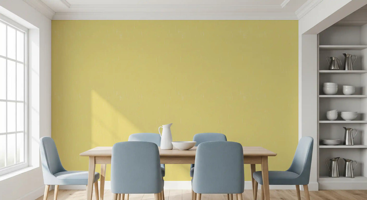 Dining room wall with linen texture wallpaper and soft yellow depth