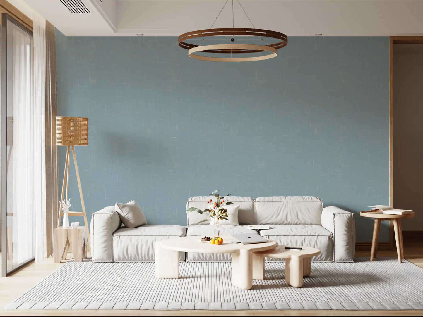 Living room with dusty blue wall wallpaper and a soft linen-look finish
