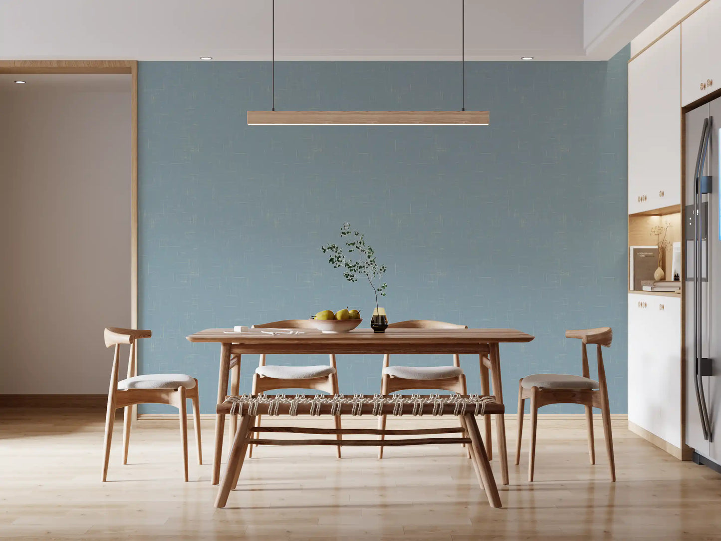 Dusty blue feature wallpaper with a smooth grain effect and clean appeal