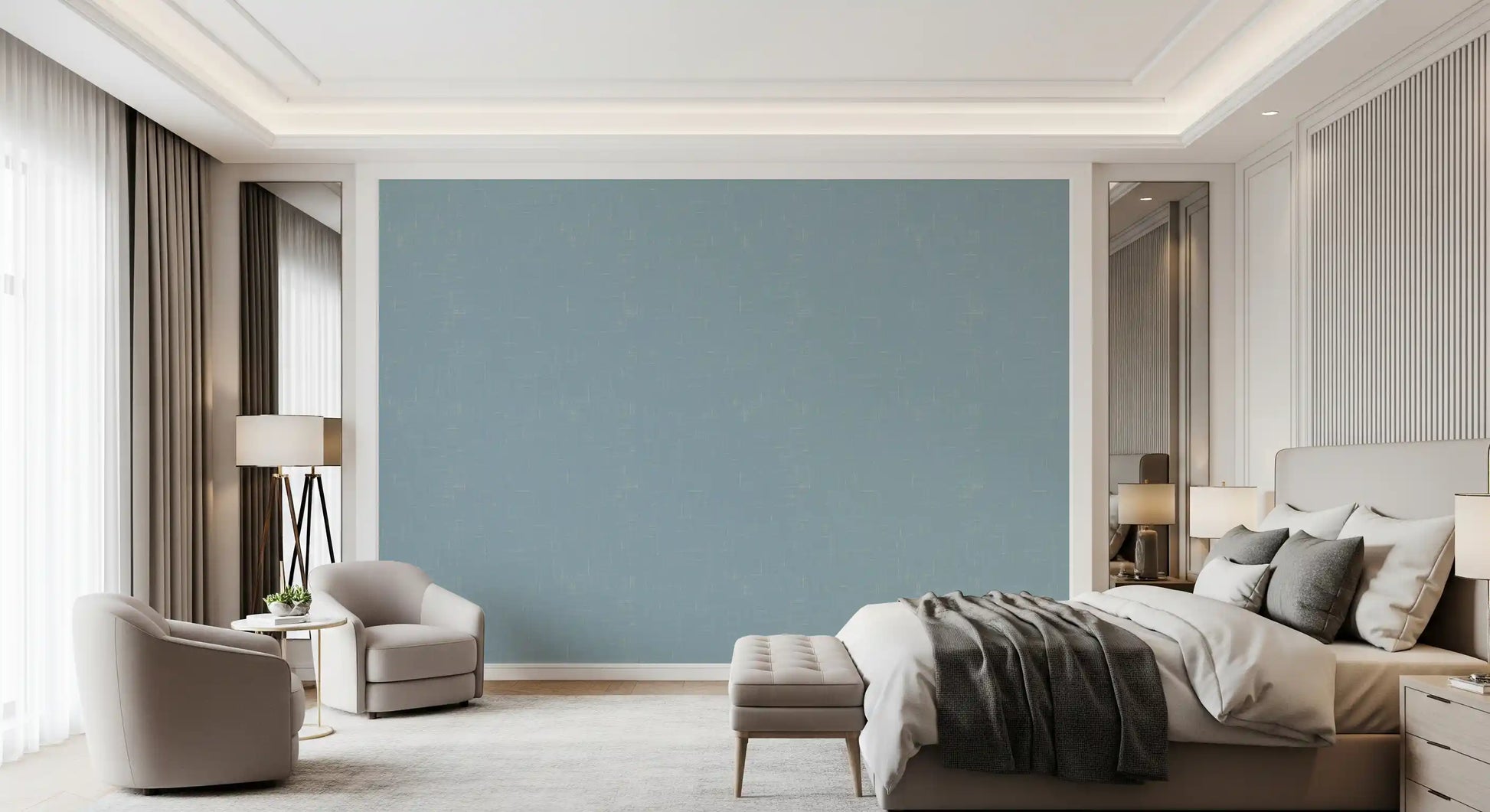 Bedroom with textured blue wallcovering and subtle fabric-style detail