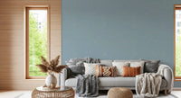 Hallway featuring blue grain wallpaper with a light retro modern texture
