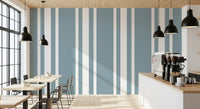 Dining space with Ticking Wallpaper and broad blue grey stripe bands