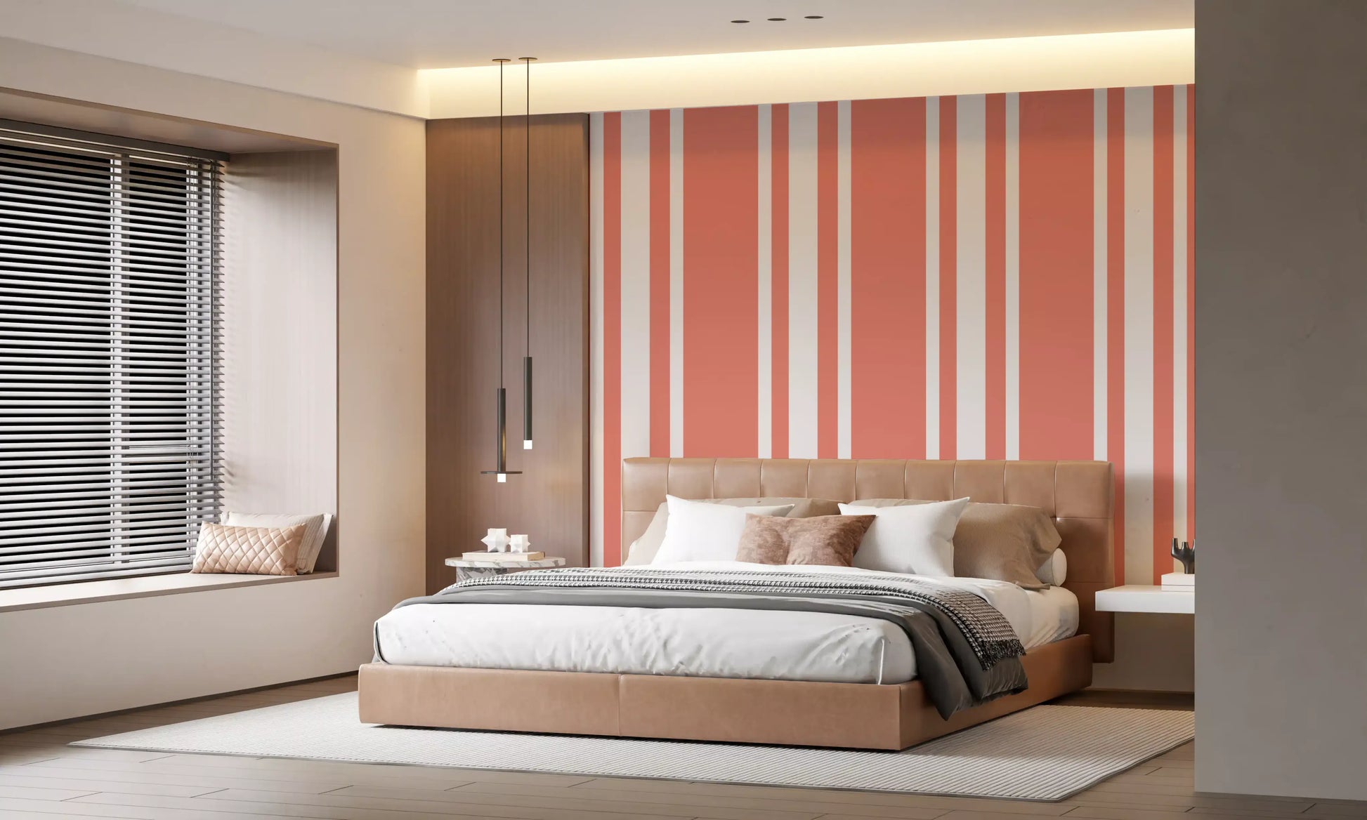 Bedroom wall styled in Coastal Stripe Wallpaper with coral detailing