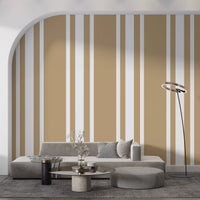 White vertical bands divide taupe wallpaper in a simple farmhouse pattern
