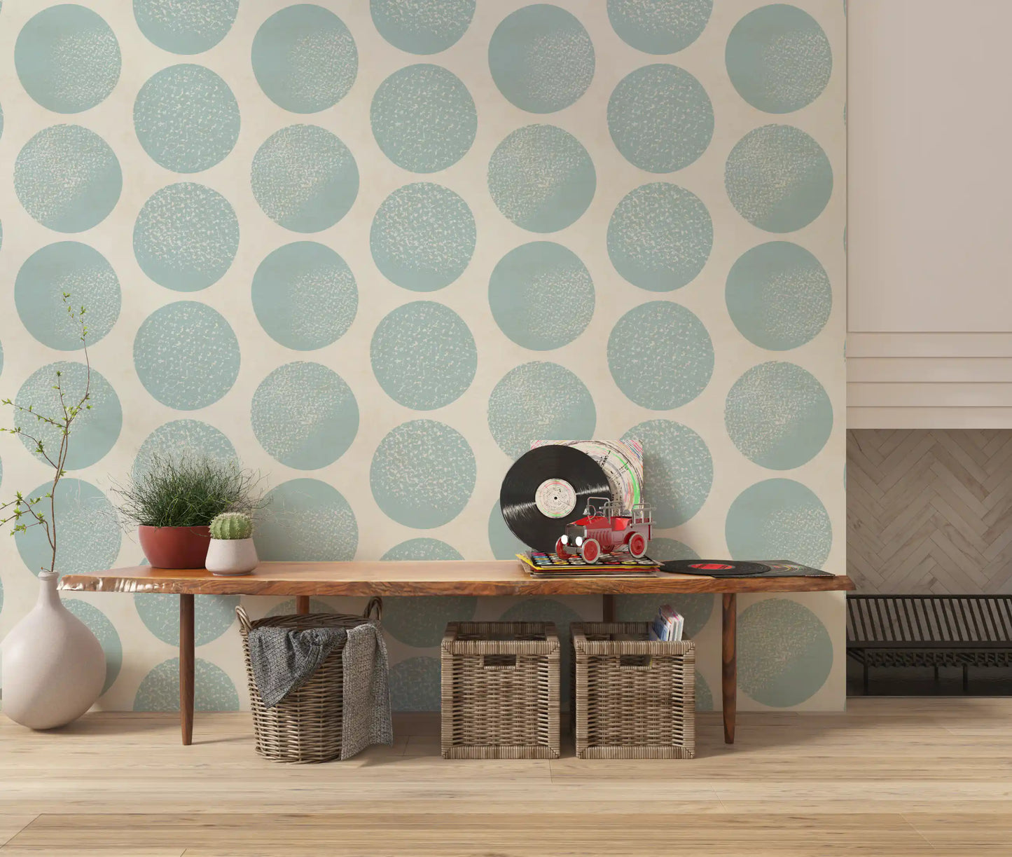 Soft blue polka dot wallpaper with large circles and a beige base