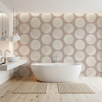 Bathroom with dusty rose dot wallpaper and large cream pattern