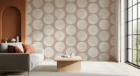Home office using soft round wallpaper and blush-toned surface texture