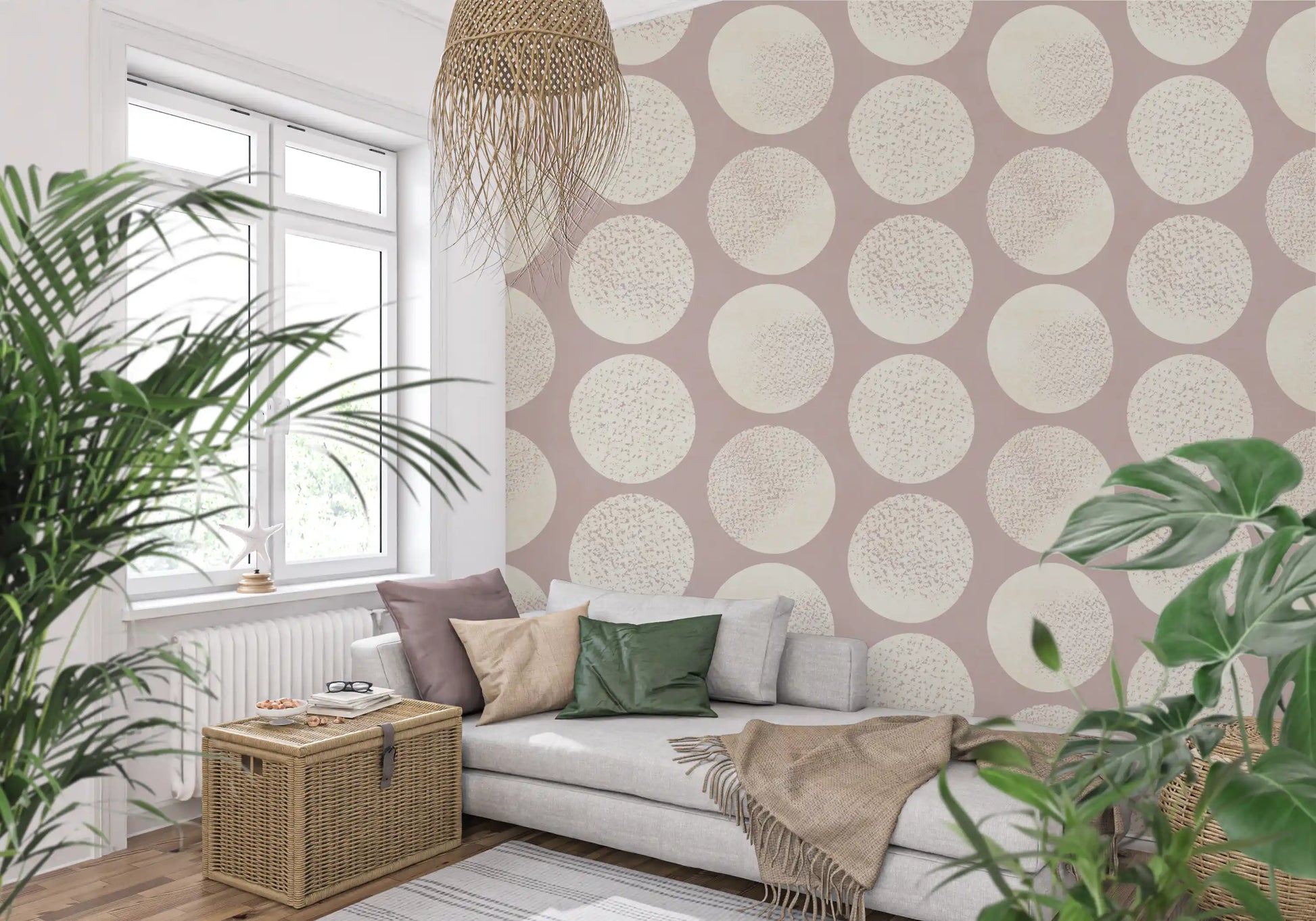 Cream round shapes sit across this blush wallpaper with gentle texture