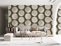 Study room styled with stippled dot wallpaper and oversized round motifs