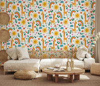 Living room wallpaper showing soft giraffes, hearts and clouds 
