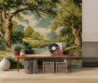 Riverbank wall mural with aged bark, grass, and soft teal reflections