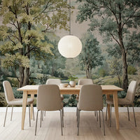 Dining room wall showing woodland river mural with soft green foliage