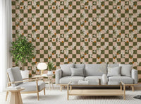 Retro boho wallpaper featuring olive checks, cream blossoms, and leaf accents