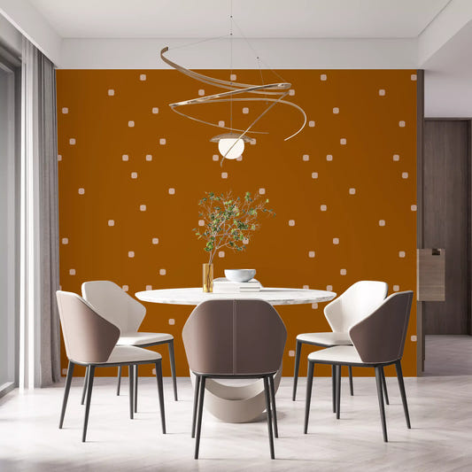Dining room wall showing terracotta beige wallpaper with soft polka dot spacing