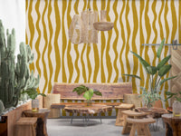 Mustard pattern wallpaper with loose flowing shapes and vintage feel