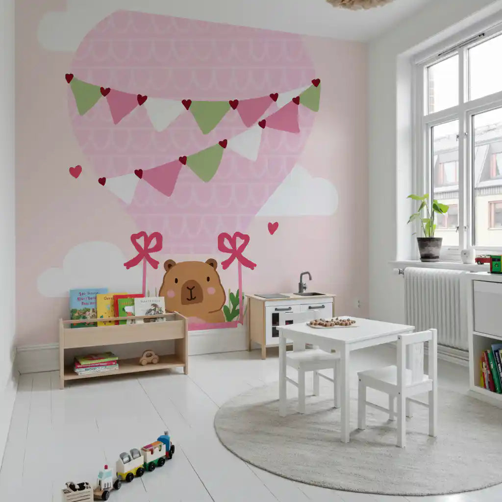 Cloud-themed wall mural with playful balloon artwork and tiny pink hearts