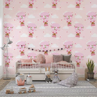 Pink nursery wallpaper with bear baskets, tiny hearts, and airy sky spacing