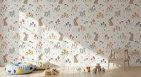 Scattered hearts and green leaves fill the Sweet Meadow Bunnies wallpaper