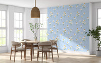 Sunlit dining room lined by the Daisy Dreams on Blue wallpaper