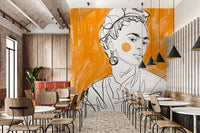 Cafe and restaurant area styled with the Tangerine Muse portrait wall mural
