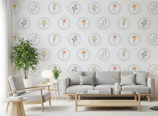 Living room with sage couch sits below the Country Wildflowers wallpaper
