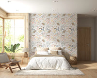 Bedroom covered in the floral Country Cottage wallpaper pattern