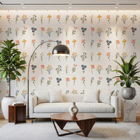 Pastel sprigs sit evenly inside the Wildflower Portraits wallpaper repeat