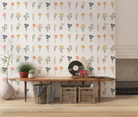 Illustrated florals pattern the Wildflower Portraits wallpaper in an even layout
