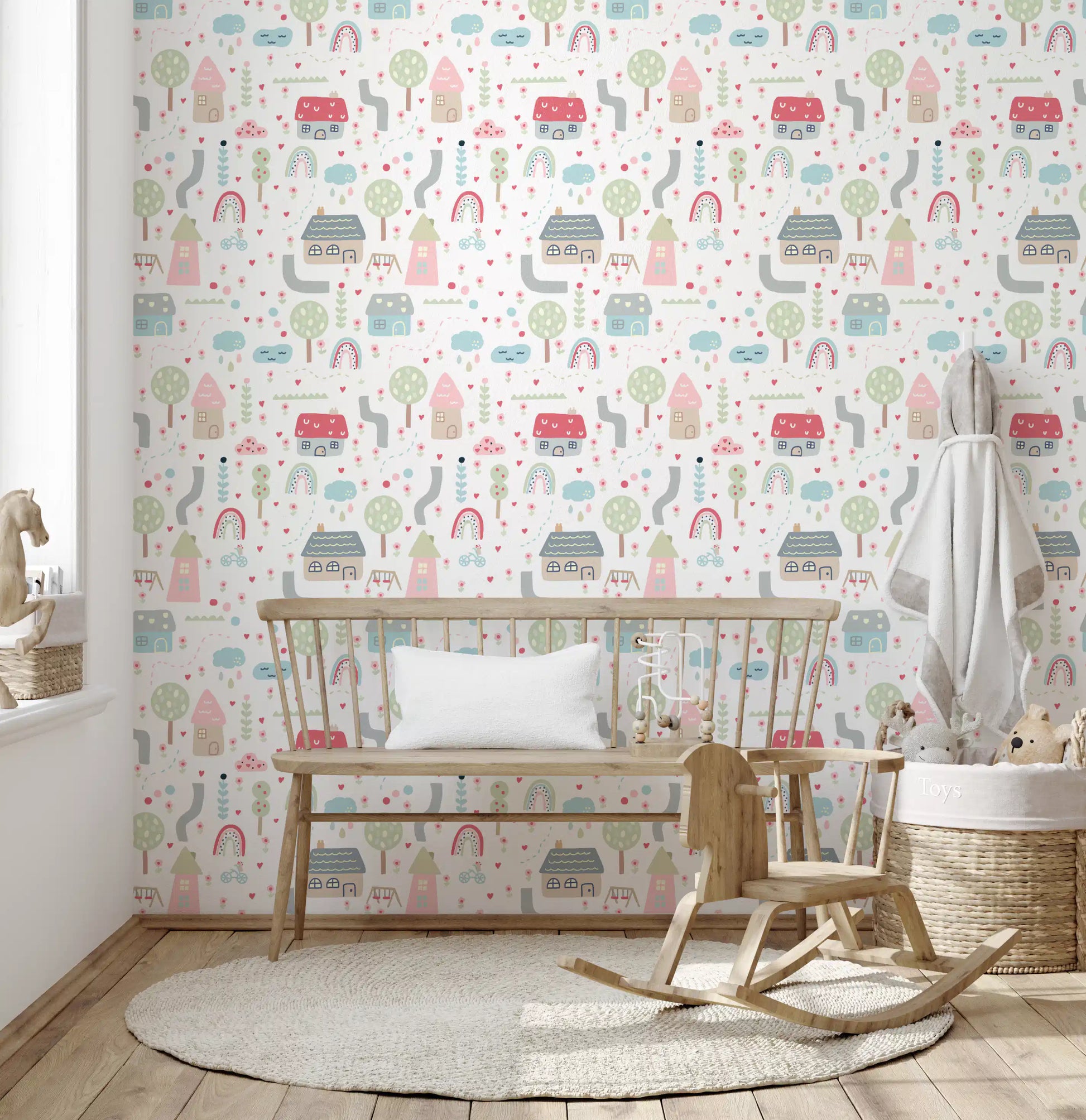 Sage trees and dusty pink rooftops scatter through the Baby wallpaper