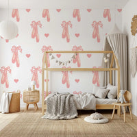 Kids' room gains a playful lift via Sweet Ballet wallpaper with bows and hearts.