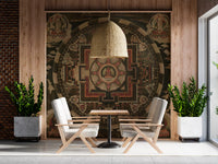 Golden detailing shines across a Dining setting showing the Sacred wall mural.