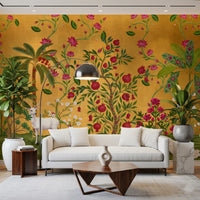 Pomegranate fruit and ruby roses spread across this golden wildlife wall mural