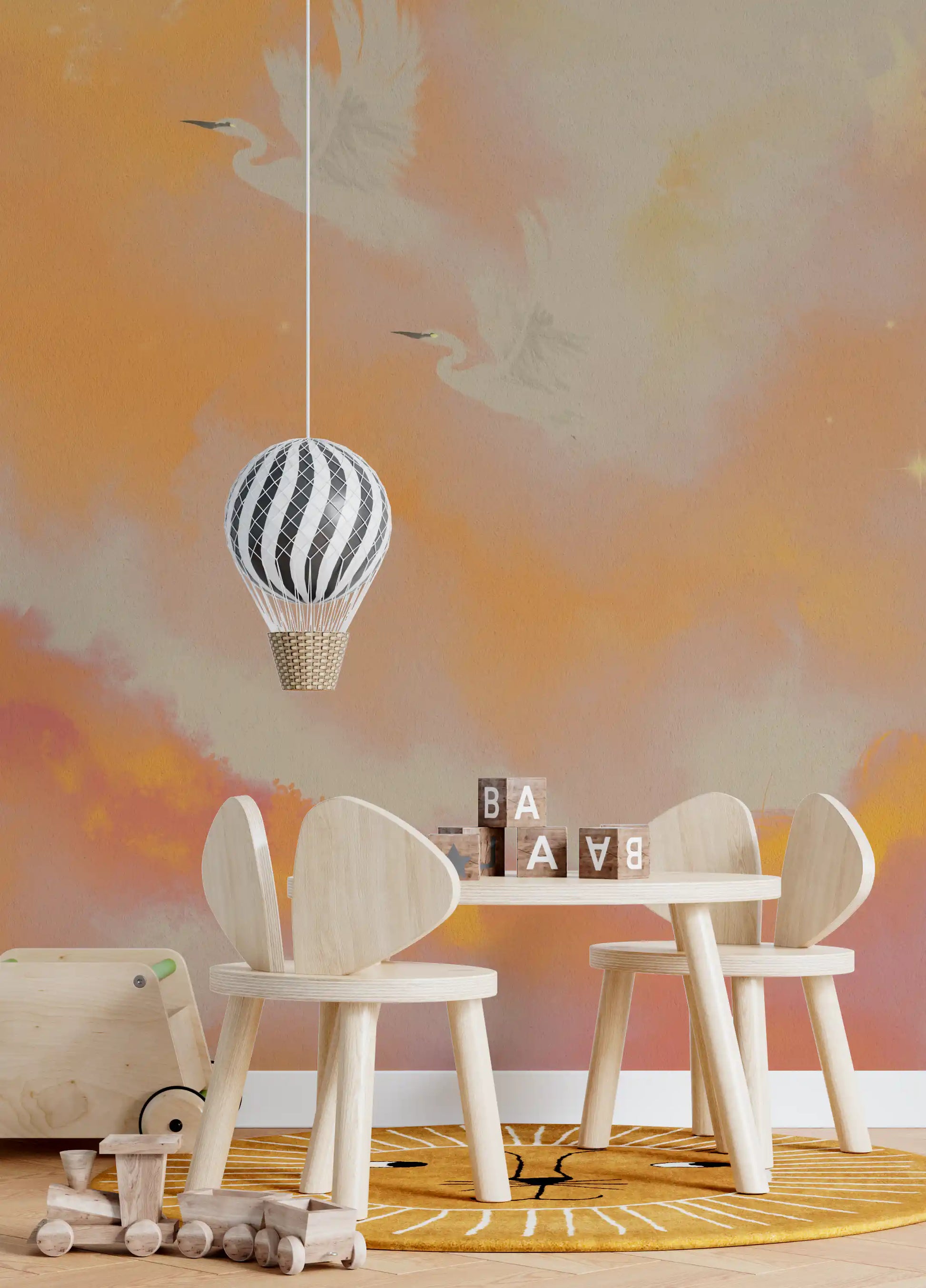 Coral and orange washes fill this sunset heron wall mural
