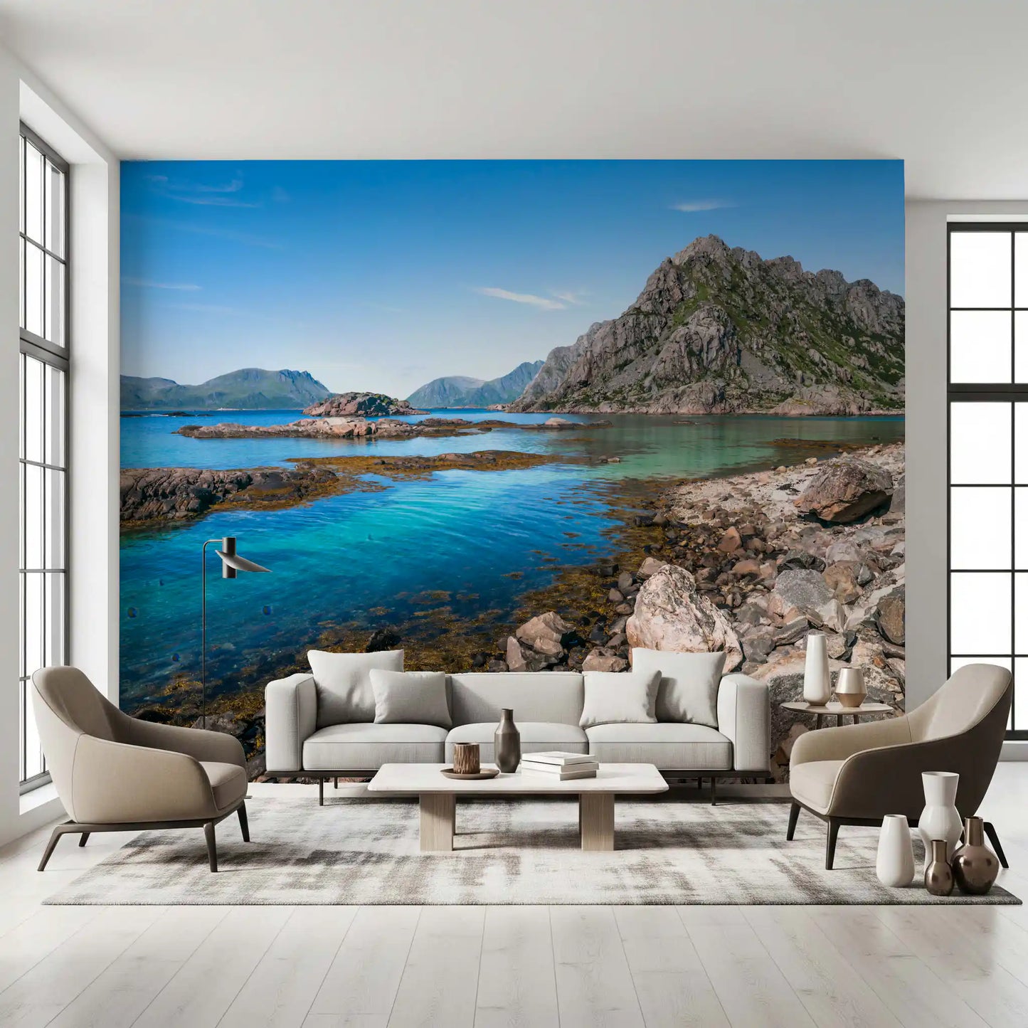 Rugged grey mountain rises over a calm bay on the Coastal Peaks wall mural