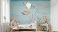 Pastel castle and a small whale shape the centre of this underwater wall mural