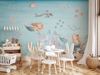 Kids play area carrying the underwater wall mural across one full side