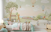 Children's room set by the gentle greens of the Animal Adventure wall mural