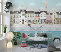 Toddler room shows sailboats and balloons across the Quaint Canal Town wall mural