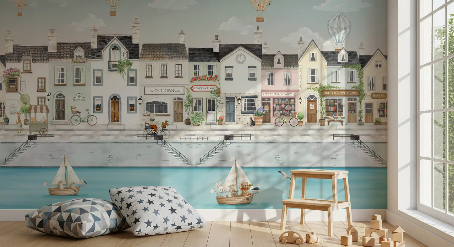 Tiny sailboats carry animal friends across the Town Dreams wall mural