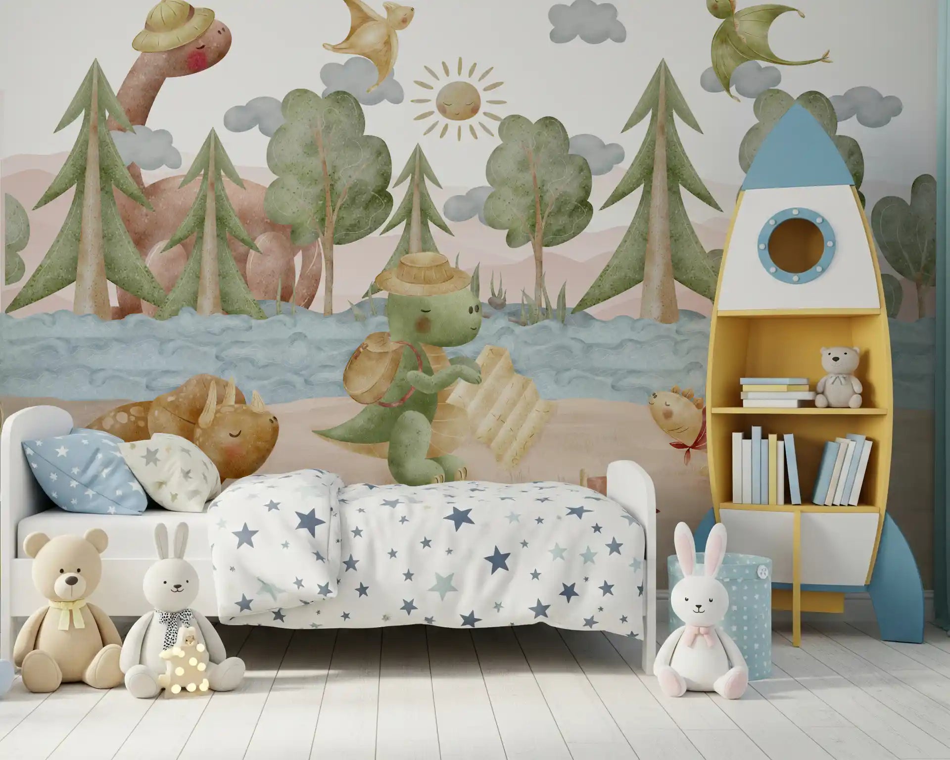 Pine trees and pastel hills painted into the Explorer's Journey wall mural