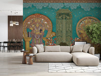 Living room seating area set against the deity and peacock wall mural