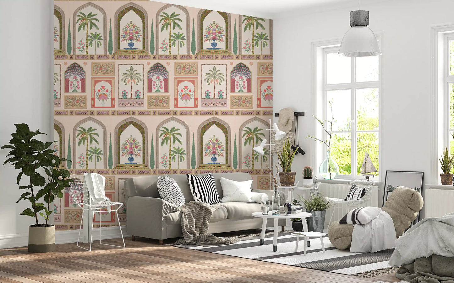 Living room with a blue sofa picks up the coral notes in the Palace wall mural